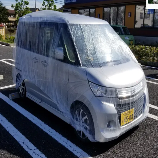 SGS RoHS Transparent PE Plastic Car Cover with Elastic Rope Fixation Cubierta De Automoviles Plastico Tampa Plastica Do Carro Housse De Voiture En Plastique