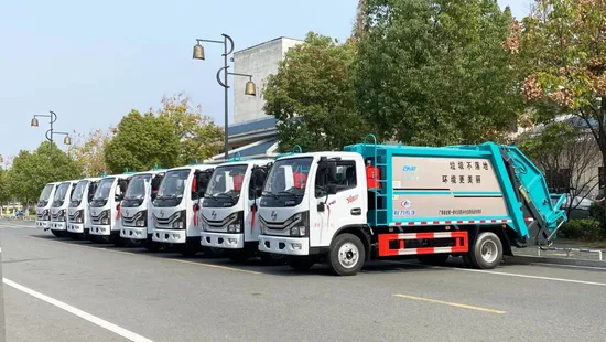 Eco-Friendly 5-Ton Compact Trash Compression Truck for Urban Areas Garbage Collection Truck in The Community Property. Garbage Collection Truck in The Parking L