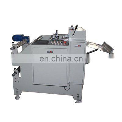 Adhesive sticker / label roll to sheet cutting machine with two unwinding shaft