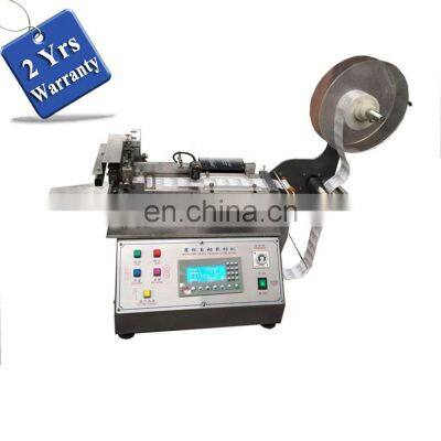 UGS2050 hot cold mini table top automatic fabric woven label cutting machine, small garment wash care ribbon cutter