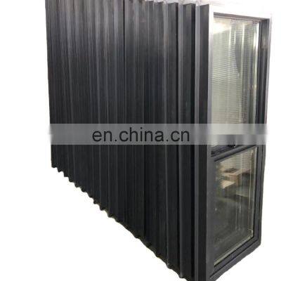 Black vinyl hung window with nail fin girds and NFRC certification