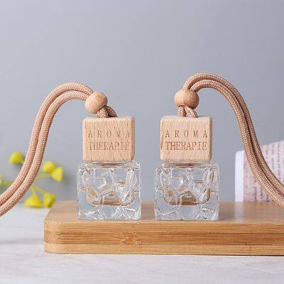 Wholesale 10ml water cube shape empty refillable glass car hanging perfume bottle