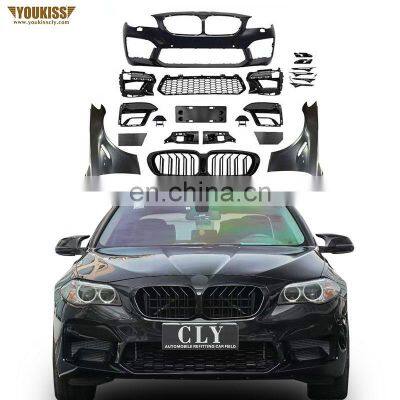 UKISS New Arrival Body Kits For BMW 2010-2017 F10/F18 Upgrade 2021 M5 Front Car Bumper With Conjoined Large Grille Fender