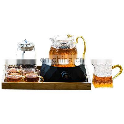 Luxury tea set glass clear tea pot set with heater and tea cup set